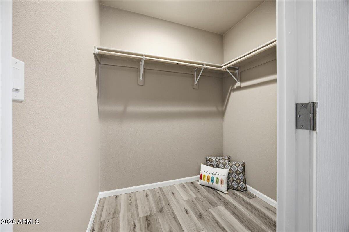 33597 South Davis Ranch Road Marana, AZ 85658 - Photo 27 of 48 a room with a bench and a table