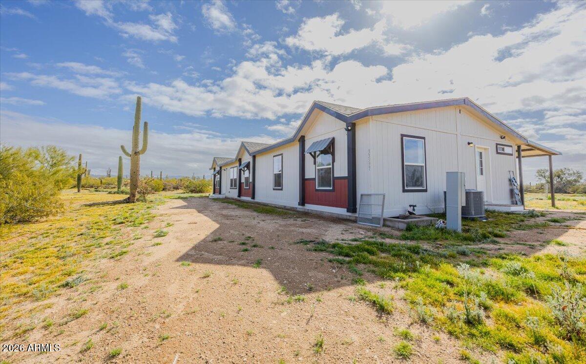 33597 South Davis Ranch Road Marana, AZ 85658 - Photo 3 of 48 a view of a house with a yard