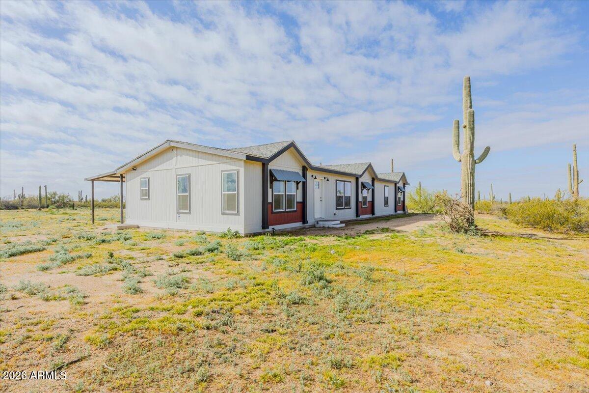 33597 South Davis Ranch Road Marana, AZ 85658 - Photo 4 of 48 a view of a house with a swimming pool