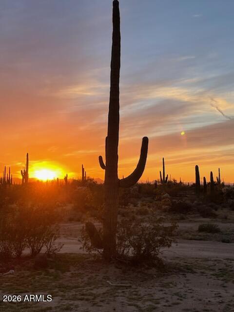 33597 South Davis Ranch Road Marana, AZ 85658 - Photo 42 of 48 a view of a ocean with sunset