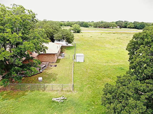 a view of a lake with a big yard