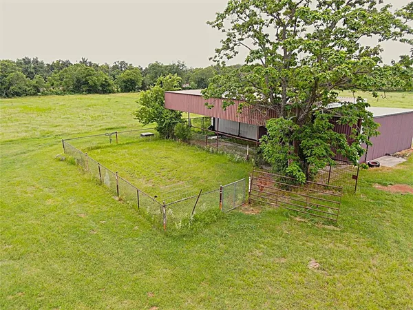a view of a lake with a yard