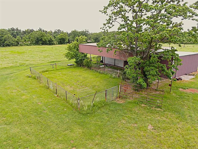 a view of a lake with a yard