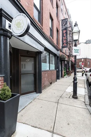a view of a building with a potted plant