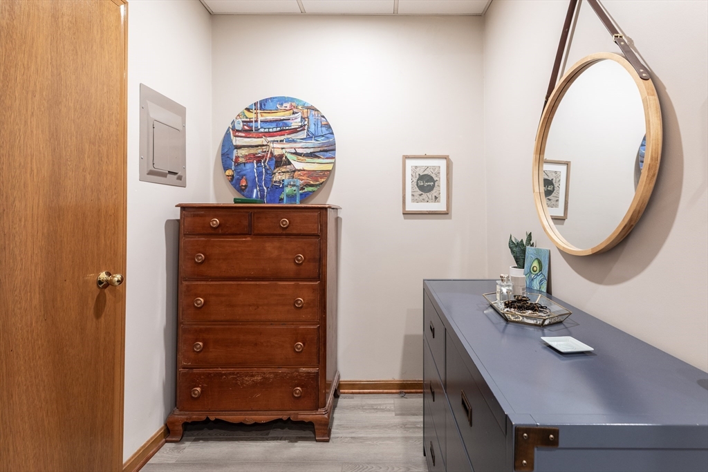 265 North Street, Unit A Boston, MA 02113 - Photo 9 of 17 a view of a hallway with furniture and a mirror
