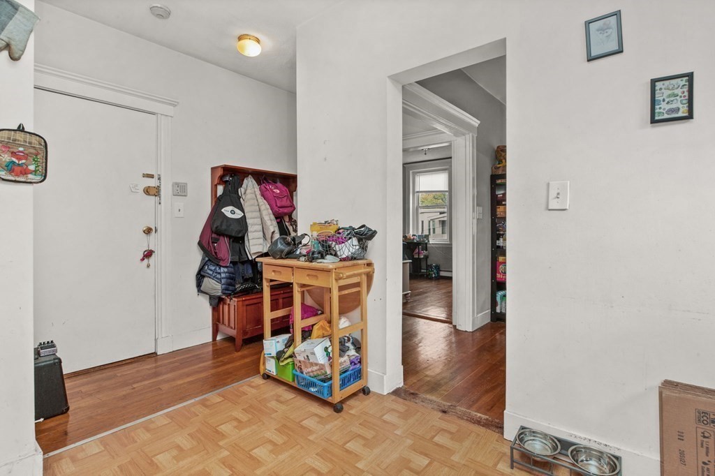 32 Ransom Road, Unit 10 Boston, MA 02135 - Photo 8 of 12 a view of living room with baby toys