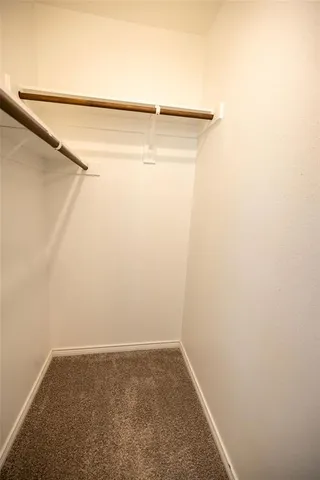 a view of small space with racks on the wall