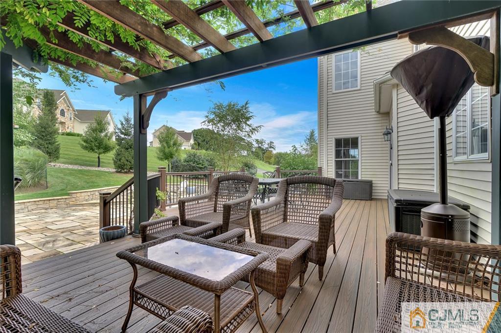21 Rolin's Mill Road Flemington, NJ 08822 - Photo 22 of 25 a view of a balcony with furniture and wooden floor