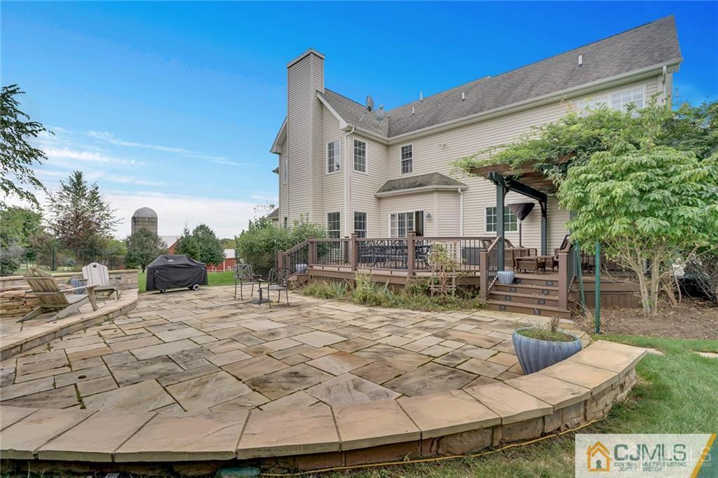 21 Rolin's Mill Road Flemington, NJ 08822 - Photo 25 of 25 a view of a white house with a yard