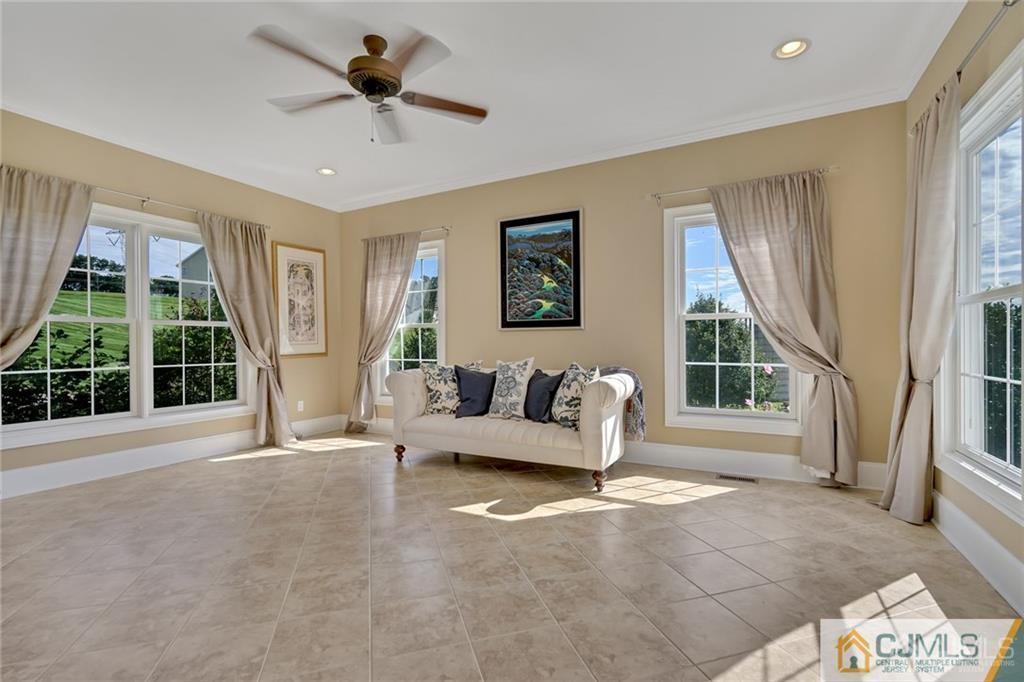 21 Rolin's Mill Road Flemington, NJ 08822 - Photo 7 of 25 a living room with furniture and a large window