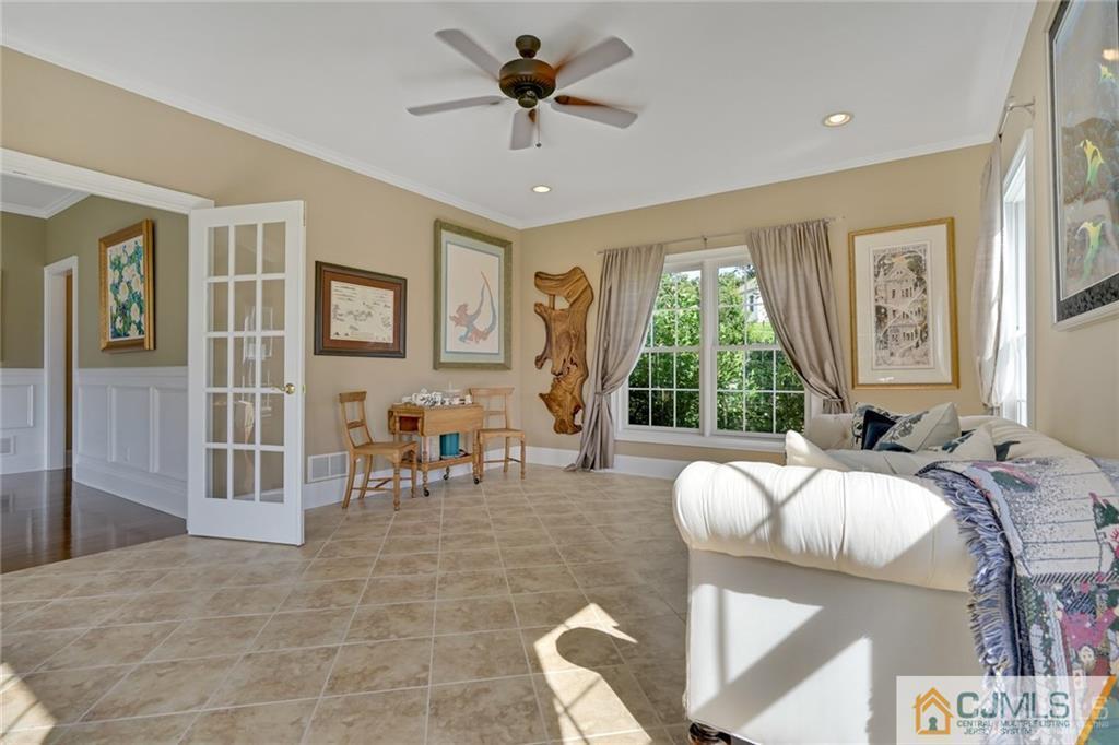 21 Rolin's Mill Road Flemington, NJ 08822 - Photo 8 of 25 a living room with furniture and a large window