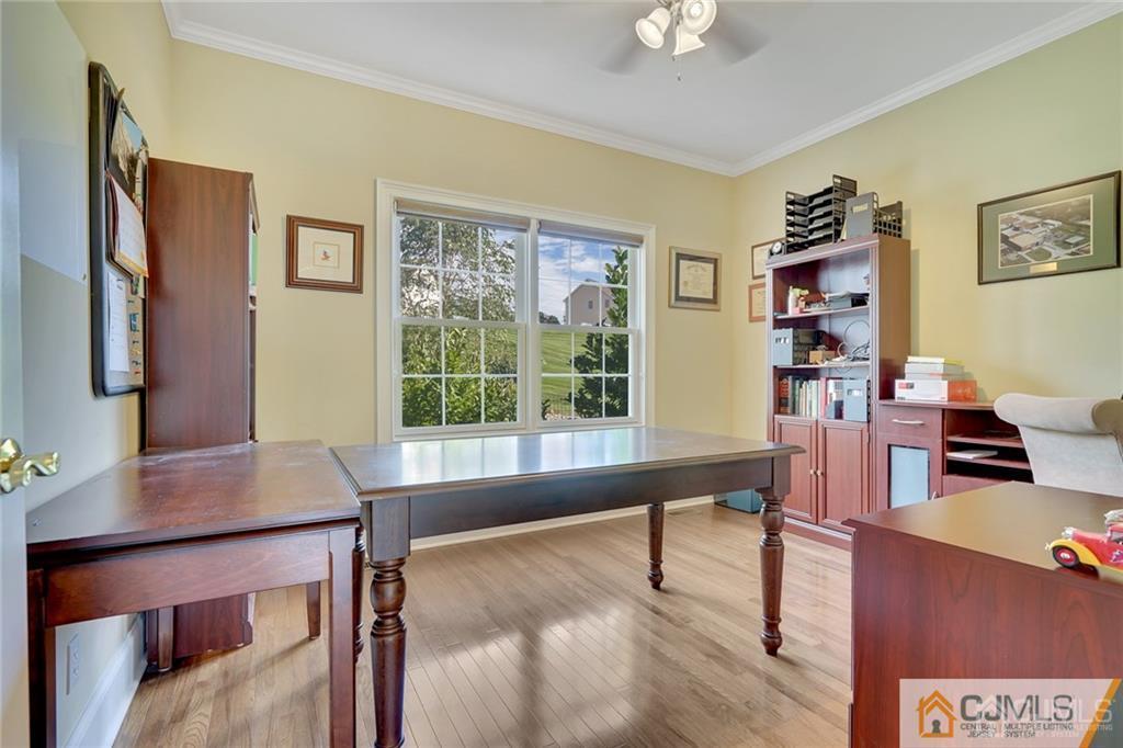 21 Rolin's Mill Road Flemington, NJ 08822 - Photo 9 of 25 a view of a workspace with furniture and a window