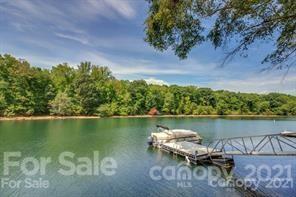 1409 Riverside Drive Charlotte, NC 28214 - Photo 2 of 23 an aerial view of a house with a lake view