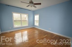 1409 Riverside Drive Charlotte, NC 28214 - Photo 13 of 23 a view of an empty room with a window