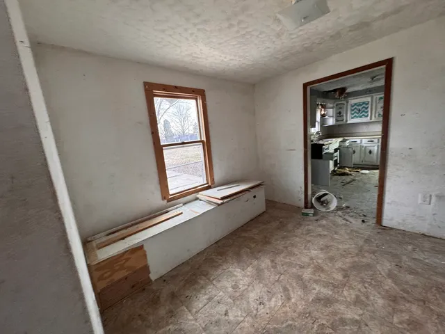 wooden floor and window in a room