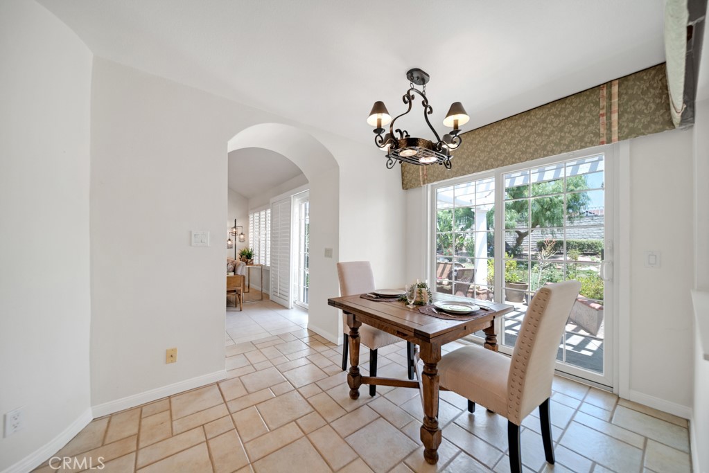 18845 Beechtree Lane Porter Ranch, CA 91326 - Photo 14 of 41 a view of a dining room with furniture window and outside view