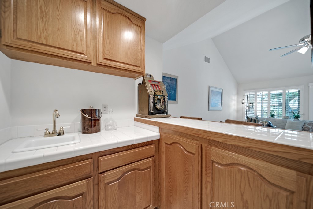 18845 Beechtree Lane Porter Ranch, CA 91326 - Photo 18 of 41 a bathroom with a sink and a mirror