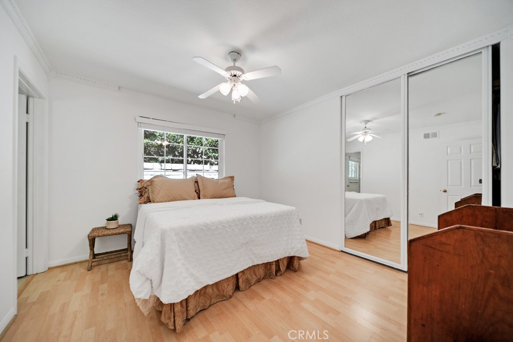 18845 Beechtree Lane Porter Ranch, CA 91326 - Photo 29 of 41 a bedroom with a bed and window