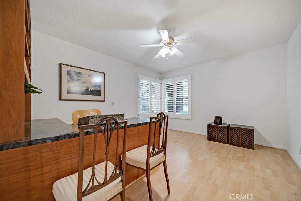 18845 Beechtree Lane Porter Ranch, CA 91326 - Photo 31 of 41 a dining room with furniture and window