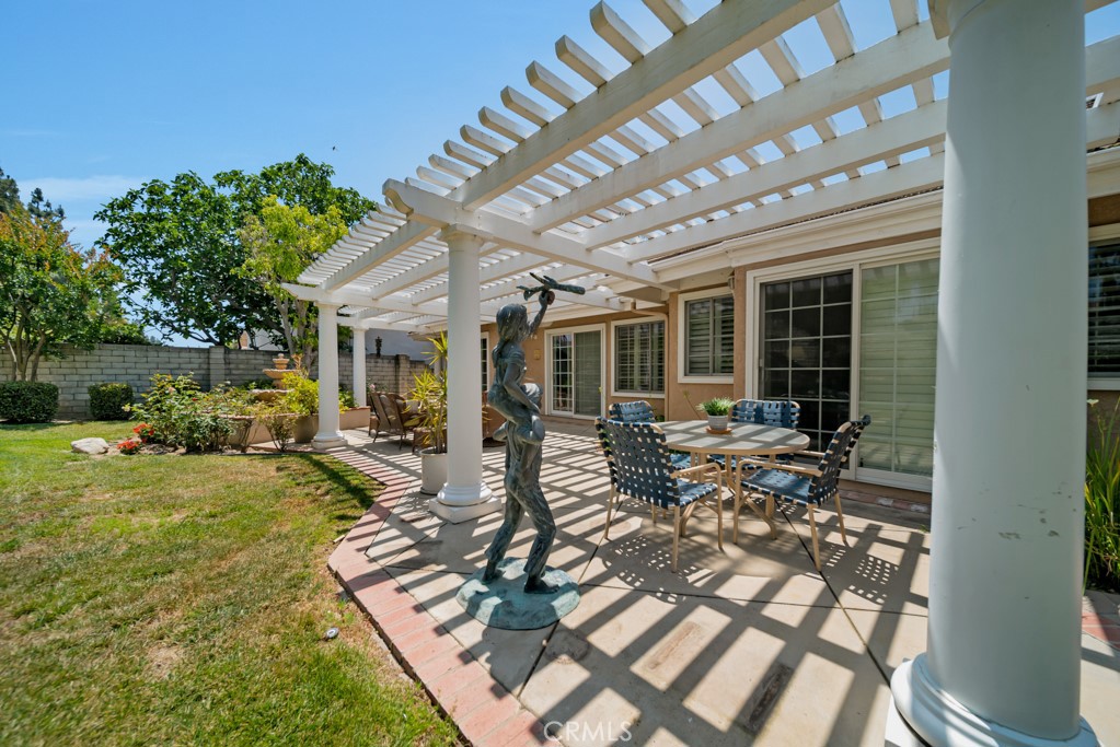 18845 Beechtree Lane Porter Ranch, CA 91326 - Photo 38 of 41 a view of a house with backyard outdoor seating area and furniture
