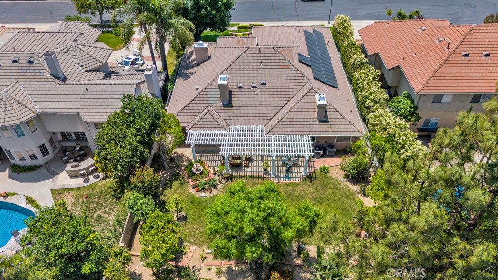 18845 Beechtree Lane Porter Ranch, CA 91326 - Photo 4 of 41 an aerial view of a house with swimming pool and porch