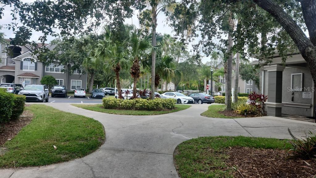 3349 South Kirkman Road, Unit 1528 Orlando, FL 32811 - Photo 1 of 1 a view of a garden with houses
