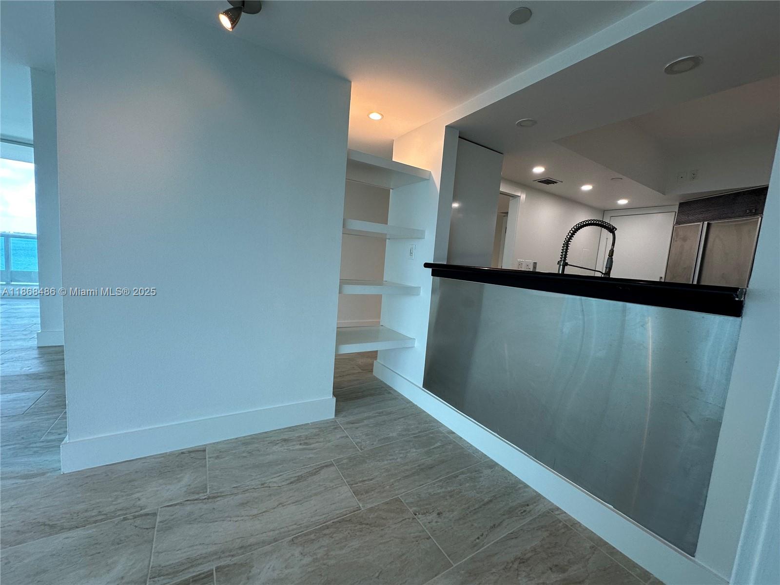 2127 Brickell Avenue, Unit 1504 Miami, FL 33129 - Photo 17 of 44 a view of a hallway with closet