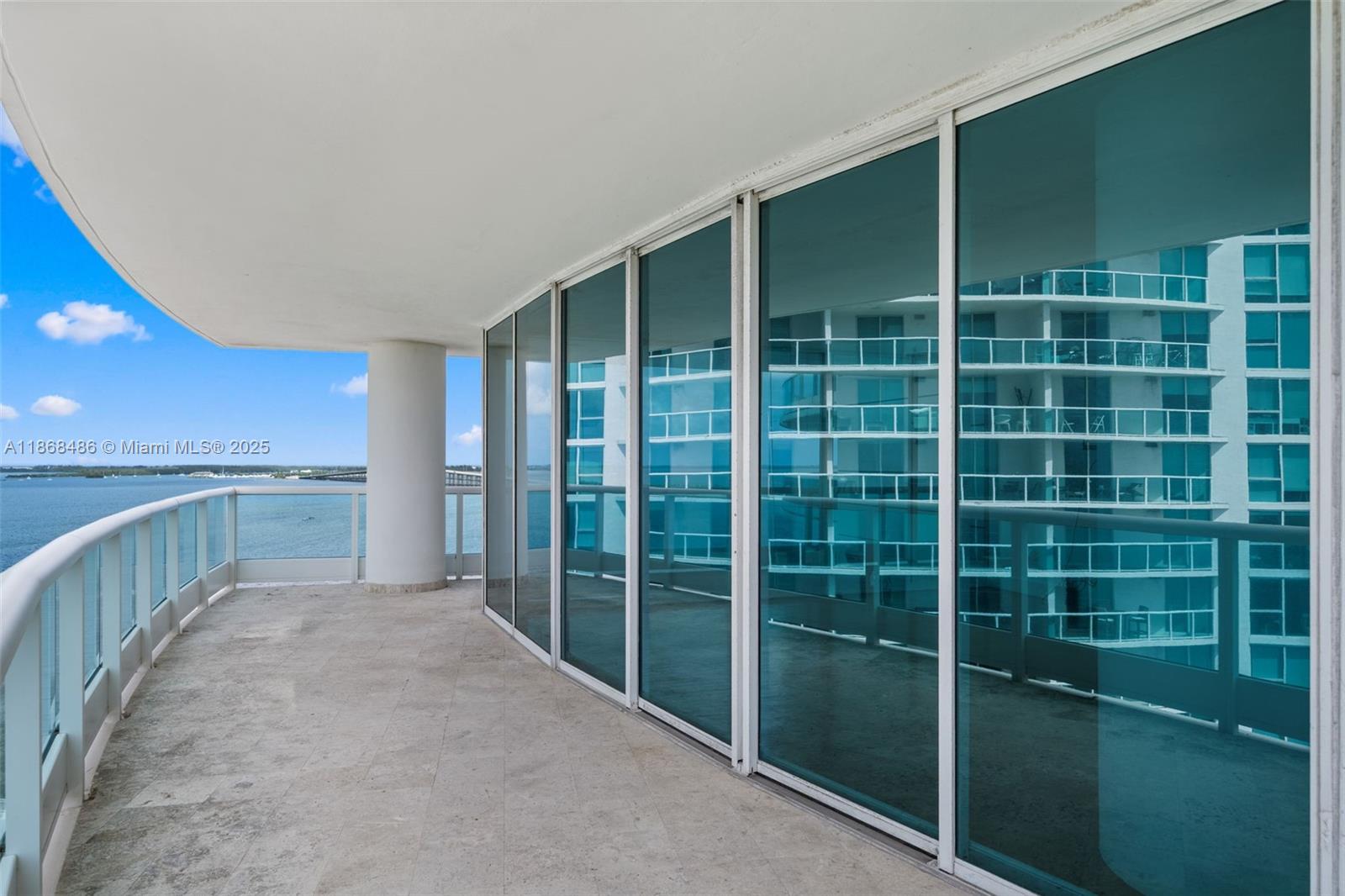 2127 Brickell Avenue, Unit 1504 Miami, FL 33129 - Photo 32 of 44 a view of a room with a large window