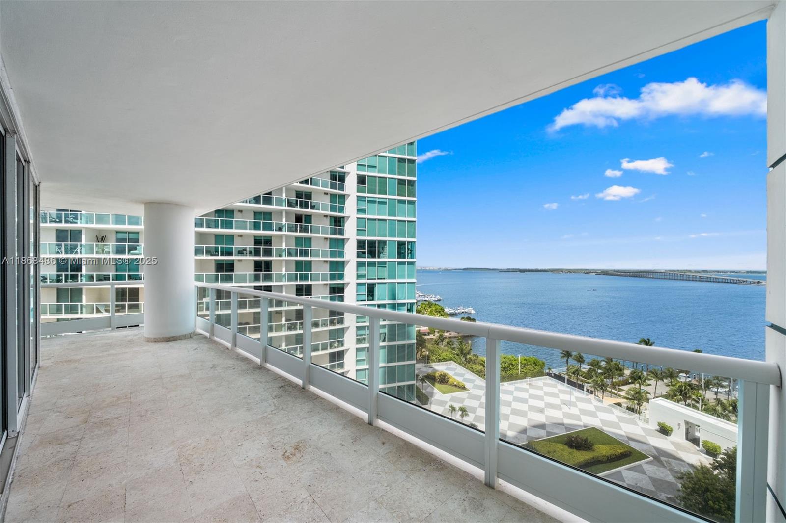 2127 Brickell Avenue, Unit 1504 Miami, FL 33129 - Photo 37 of 44 a view of a balcony and a floor to ceiling window