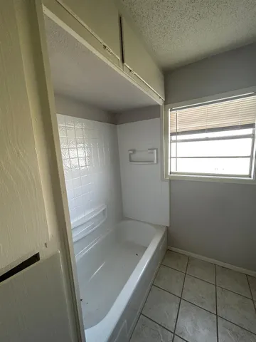 a bathroom with a bathtub
