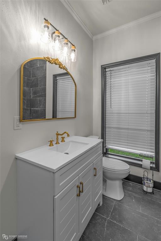 207 Red River Street Benton, LA 71006 - Photo 15 of 29 a bathroom with a sink a toilet and a mirror