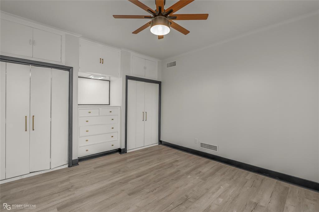 207 Red River Street Benton, LA 71006 - Photo 18 of 29 an empty room with closet and fan