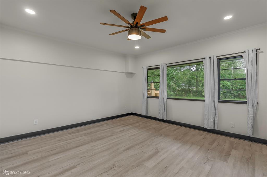 207 Red River Street Benton, LA 71006 - Photo 21 of 29 a view of an empty room with a window