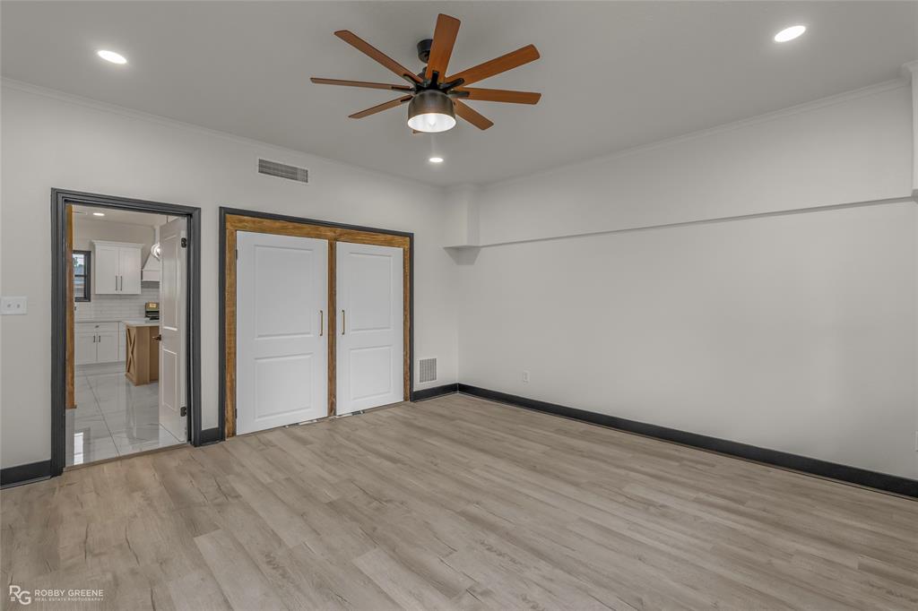 207 Red River Street Benton, LA 71006 - Photo 22 of 29 an empty room with fan and a ceiling fan