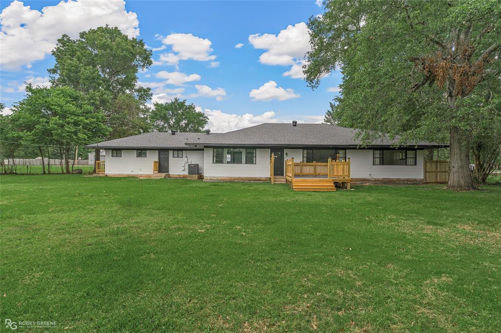 207 Red River Street Benton, LA 71006 - Photo 24 of 29 a view of a house with a yard