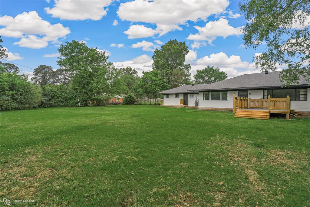 207 Red River Street Benton, LA 71006 - Photo 26 of 29 a view of a house with a yard
