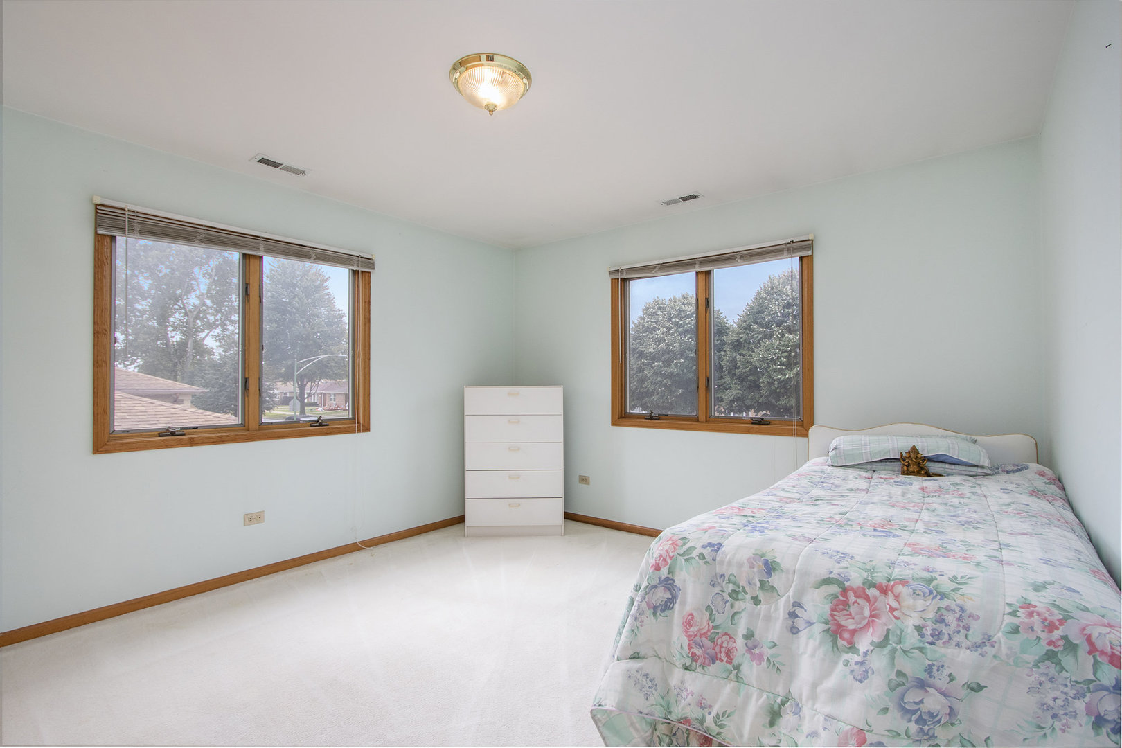 12901 South Muskegon Avenue Chicago, IL 60633 - Photo 21 of 25 a bedroom with a bed and a window