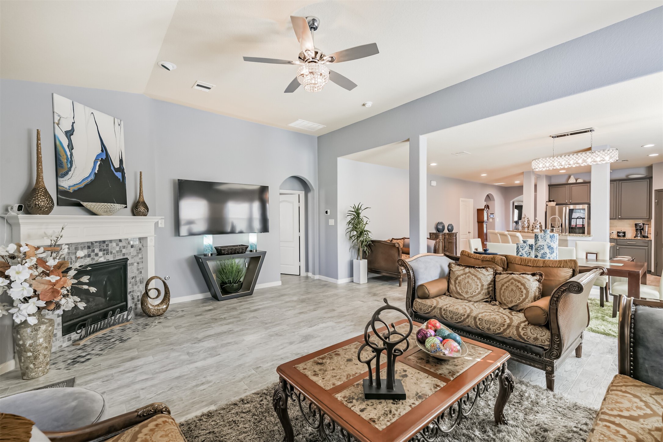 24047 Schults Meadow Lane Spring, TX 77389 - Photo 9 of 47 a living room with furniture and a fireplace