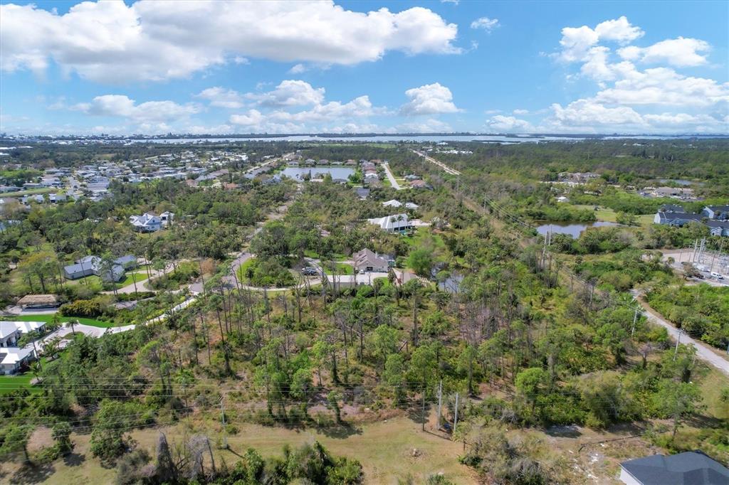 9232 Spring Valley Road Englewood, FL 34224 - Photo 11 of 21 a view of a city with lots of trees