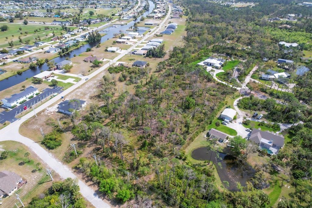 9232 Spring Valley Road Englewood, FL 34224 - Photo 12 of 21 an aerial view of residential houses with outdoor space