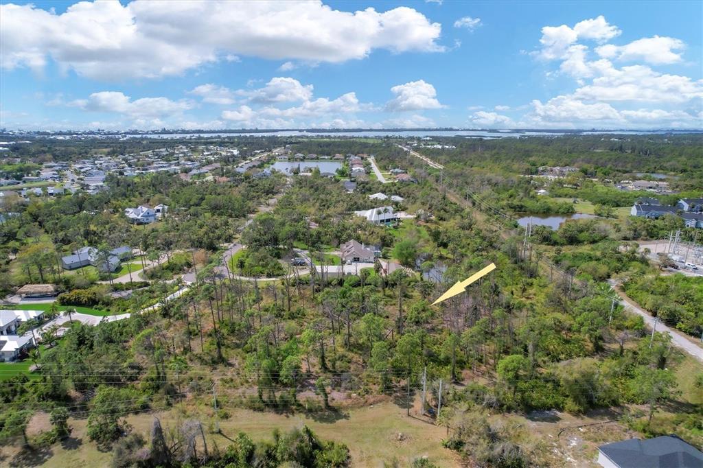 9232 Spring Valley Road Englewood, FL 34224 - Photo 6 of 21 a view of a city with lots of trees