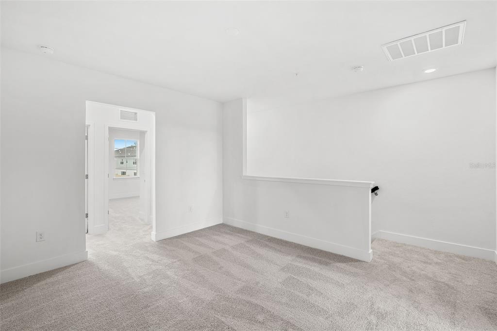 2438 Magnolia Reserve Road Ocoee, FL 34761 - Photo 17 of 26 an empty room with a empty space