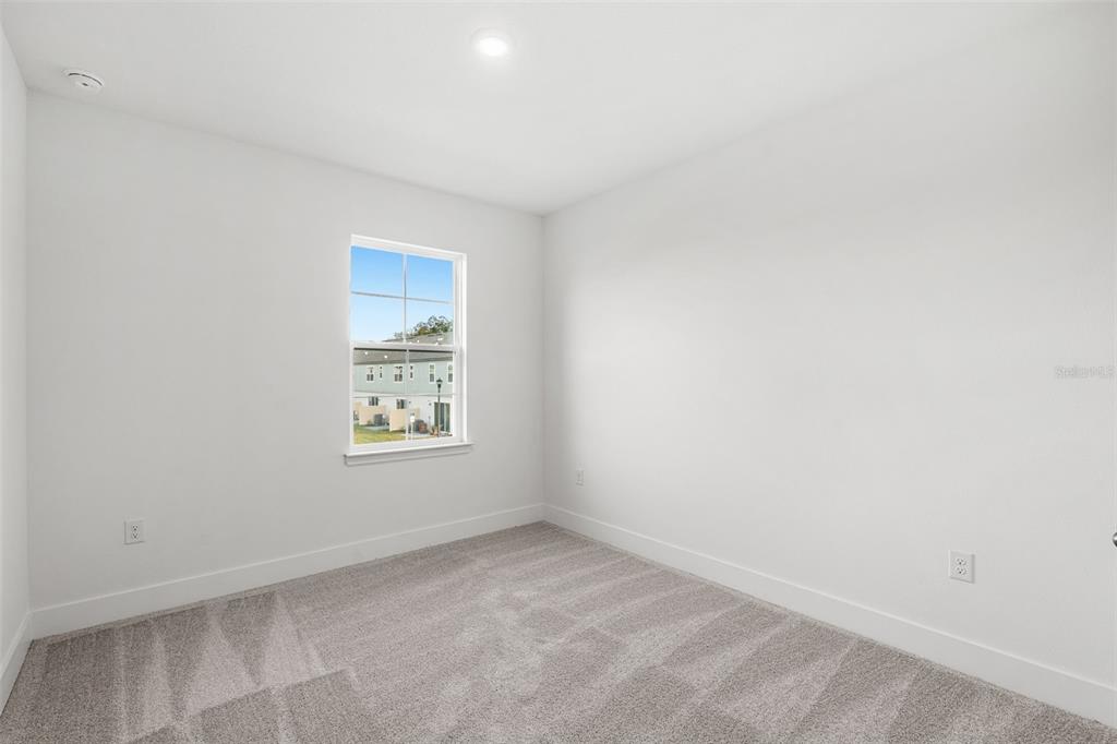 2438 Magnolia Reserve Road Ocoee, FL 34761 - Photo 21 of 26 a view of an empty room and window