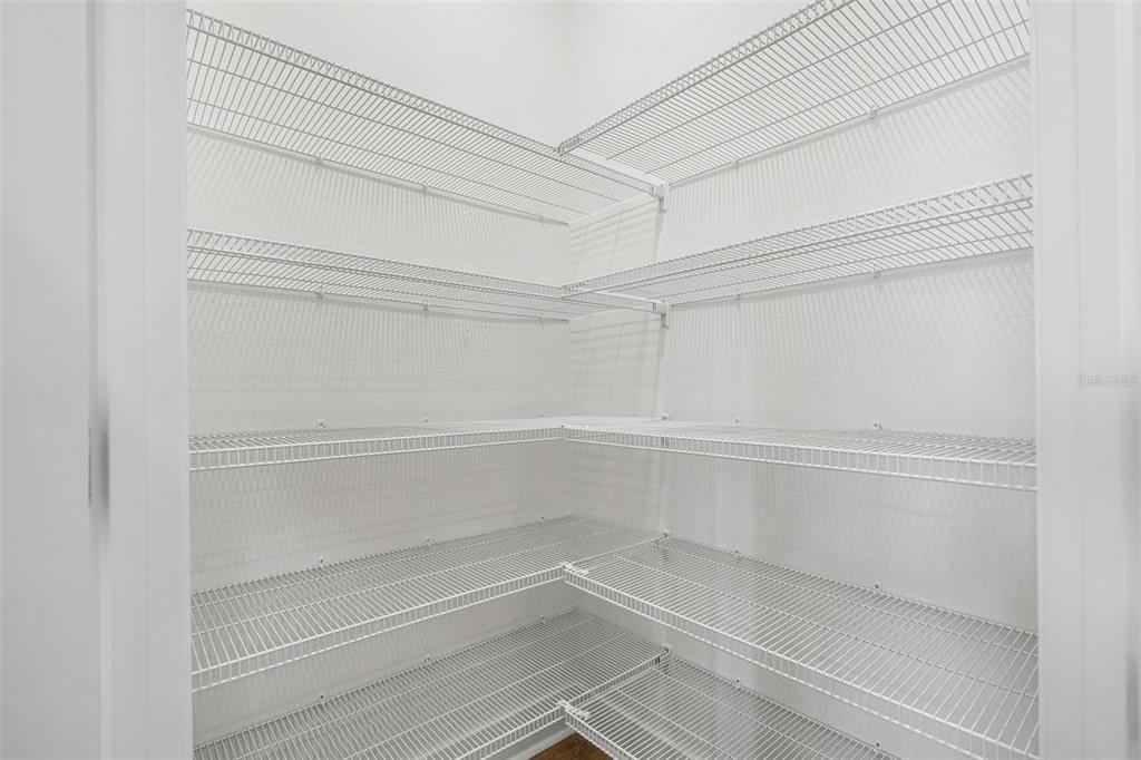 2438 Magnolia Reserve Road Ocoee, FL 34761 - Photo 26 of 26 a view of an empty walk in closet