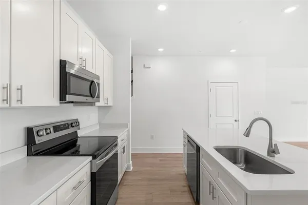 a bathroom with a sink and mirror