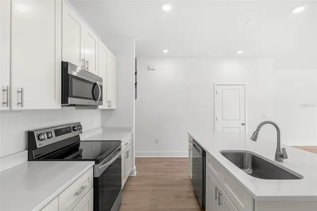 a bathroom with a sink and mirror