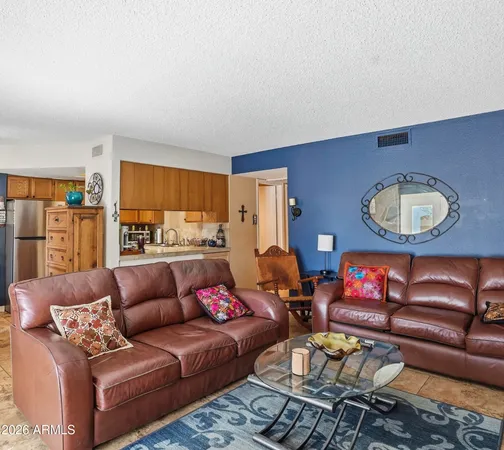 a kitchen with a sink stove top oven and cabinets