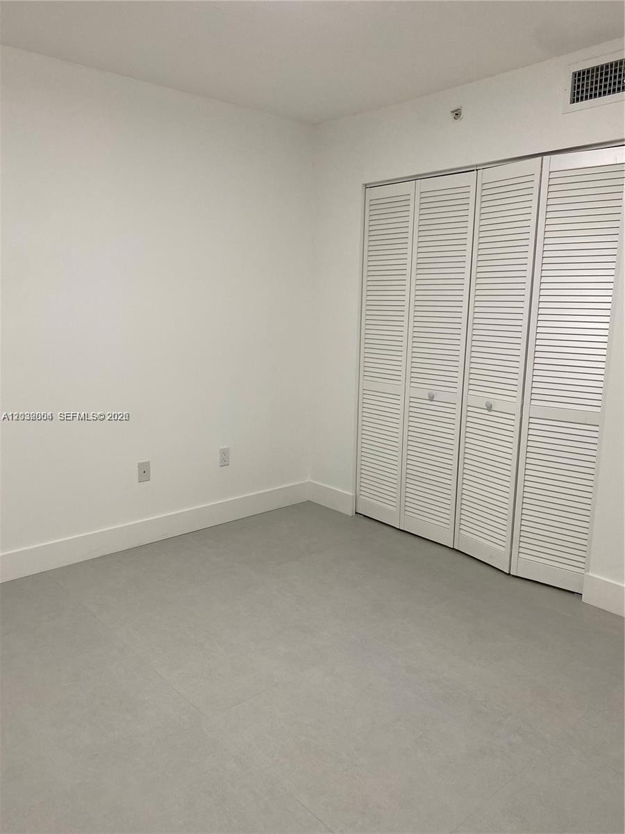 15480 Southwest 284th Street, Unit 2203 Homestead, FL 33033 - Photo 11 of 13 a view of an empty room