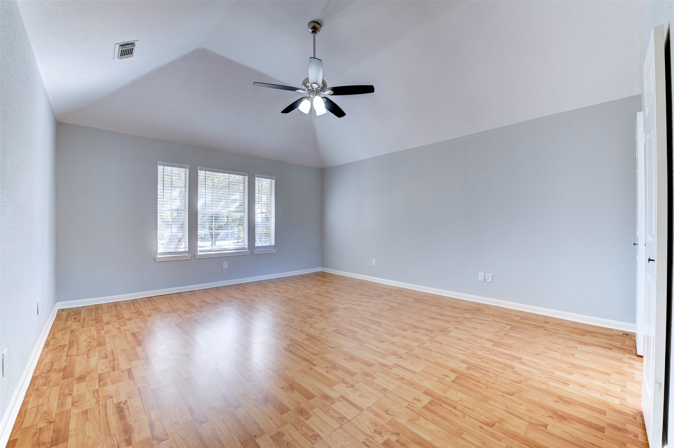 11434 High Bridge Court Houston, TX 77065 - Photo 25 of 31 a view of an empty room with wooden floor and a window