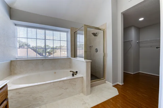 a view of a house with swimming pool in front of it